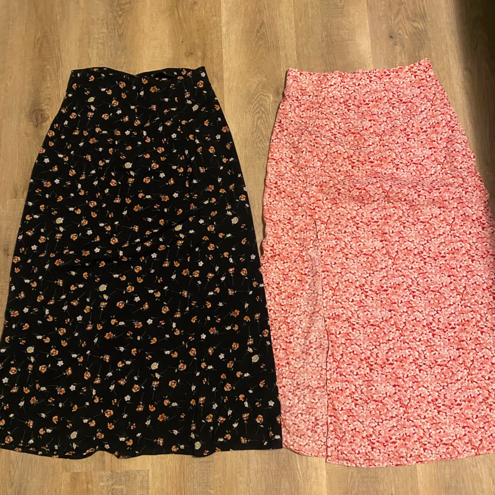 Dress up or down skirts. Pink and black patterned floral skirts.